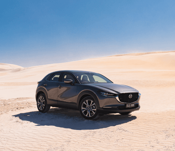 A SNOWBOARDING ON SAND ADVENTURE IN THE MAZDA CX-30